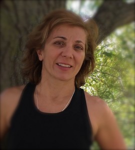 A photo of Louise Lee, a trainer for Forward Motion Yoga.