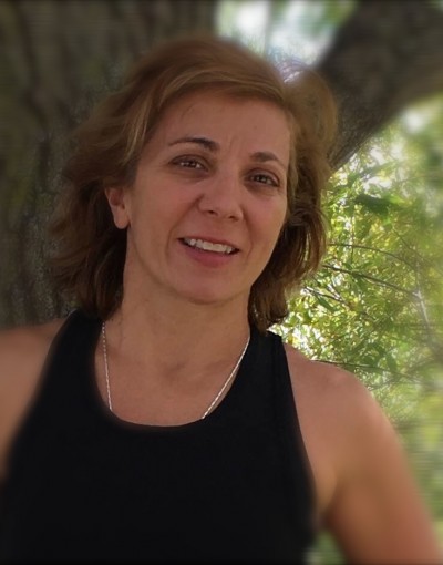 A photo of Louise Lee, a trainer for Forward Motion Yoga.