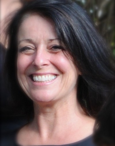 A photo of Melody Fields, an administrator at Forward Motion Yoga.